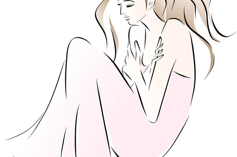 自分を抱きしめる女性